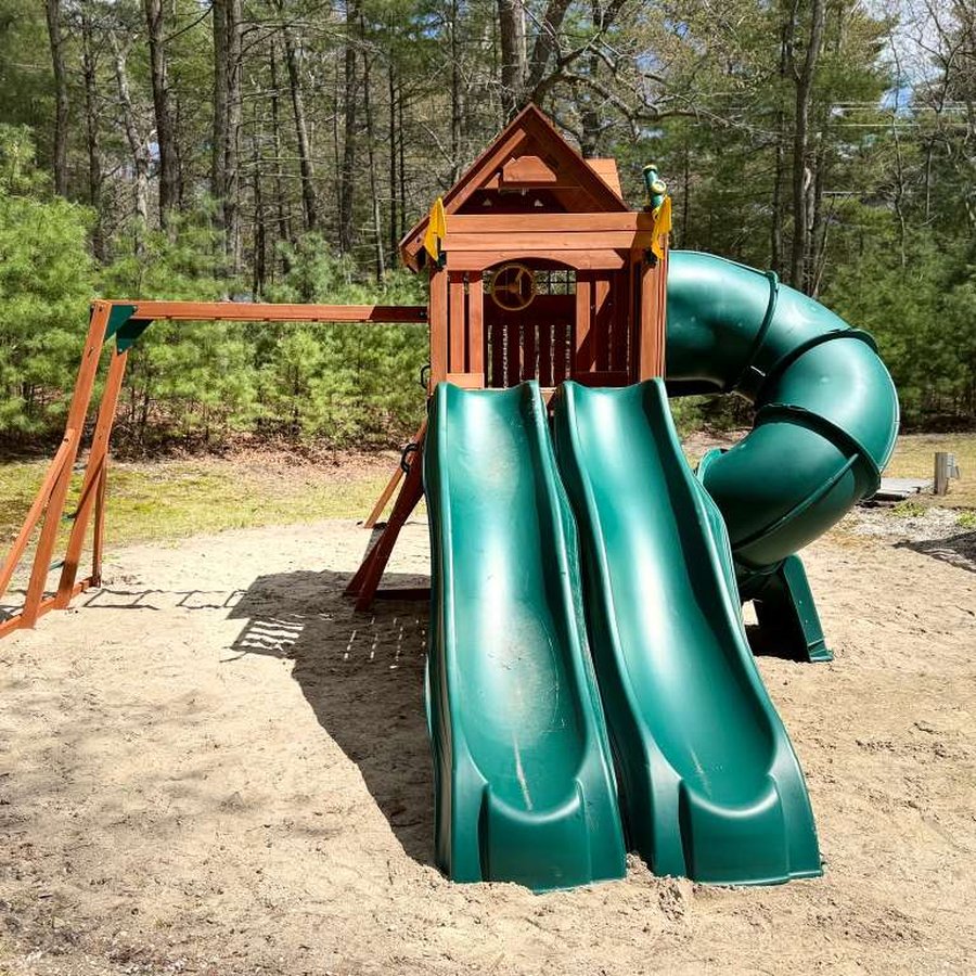 Wooden swing set with slide