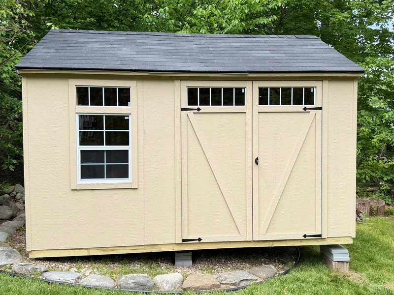Custom storage shed assembly by Elite Group Carpentry